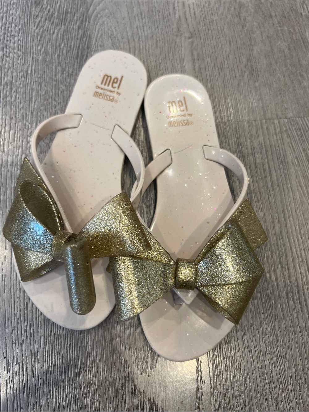 Mel by Melissa Kids Gold Bow Glitter Flip Flops